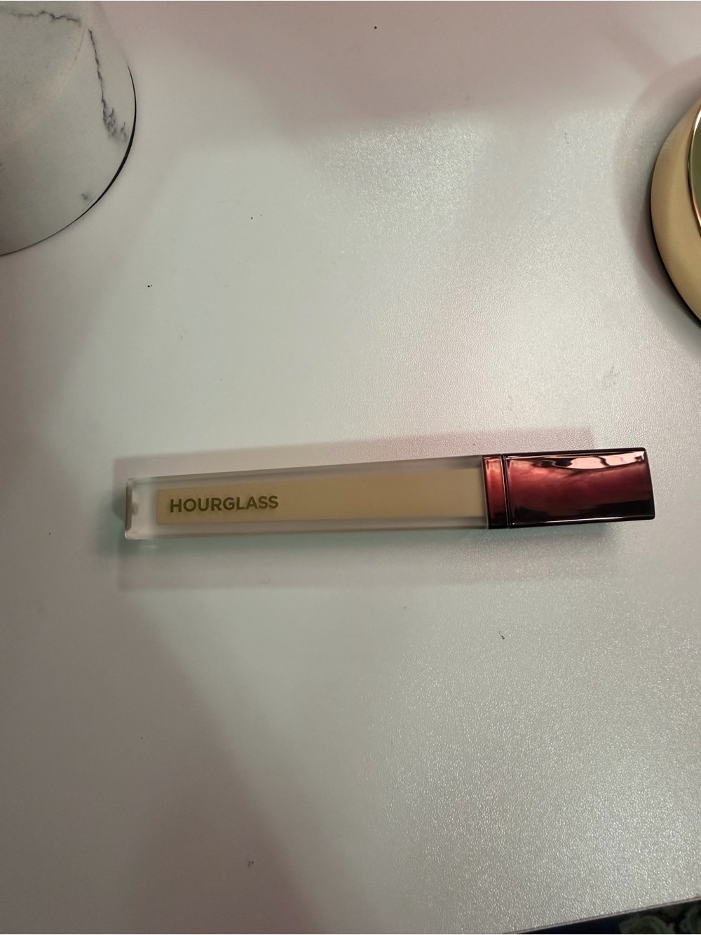 Hourglass Liquid Concealer in Light Beige with Rose Gold Cap